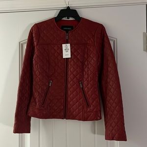 Burgundy red Neiman Marcus real leather jacket. New with tags. Never worn. Xs.